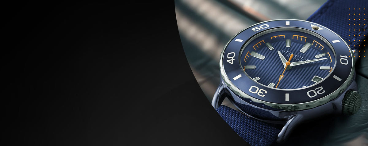 Blue wristwatch with a detailed face on a dark background