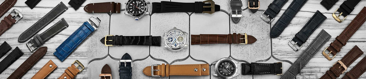 Collection of various watch straps on a checkered background